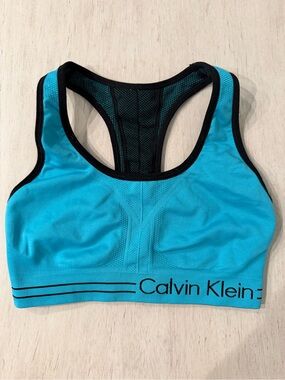BRAND NEW Calvin Klein Women’s Reversible Turquoise & Black Sports Bra